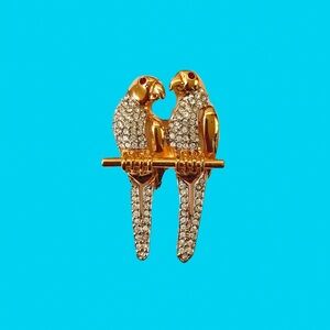 vintage gold tone parrots pin pave white crystals red jewel eyes signed by Keyes